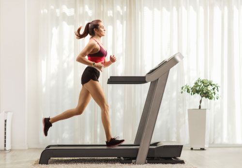 woman running on a treadmill